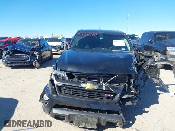 2018 Chevrolet Colorado 2WD Z71 with VIN 1GCGSDEN7J1117011, listed as a IAAI auction lot 41728108 with 51,618 mi miles and . Bid and sale history available at DreamBid. Image 12.
