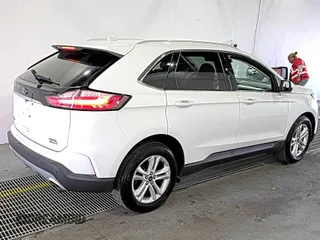 2019 Ford Edge SEL with VIN 2FMPK3J9XKBC37759, listed as a IAAI auction lot 42666643 with 103,812 mi miles and . Bid and sale history available at DreamBid. Image 6.