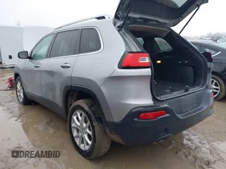 2016 Jeep Cherokee Latitude with VIN 1C4PJLCB7GW273440, listed as a IAAI auction lot 41452456 with 106,048 mi miles. Bid and sale history available at carsss.com. Image 3.