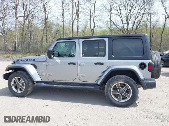 2018 Jeep Wrangler Unlimited Sahara with VIN 1C4HJXEG4JW141540, listed as a IAAI auction lot 42148402 with 43,909 mi miles and . Bid and sale history available at DreamBid. Image 14.