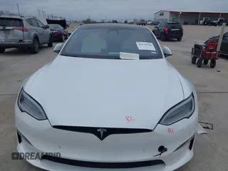 2021 Tesla Model S Plaid z VIN 5YJSA1E64MF452744, wystawiony jako IAAI lot #41375136 z przebiegiem Nie podano mil oraz . Historia ofert i sprzedaży dostępna na DreamBid. Obrazek 10.