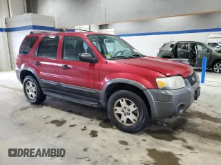2005 Ford Escape XLT with VIN 1FMYU93115KA57475, listed as a Copart auction lot 51504325 with 165,235 mi miles and Salvage Title. Bid and sale history available at carsss.com. Image 4.