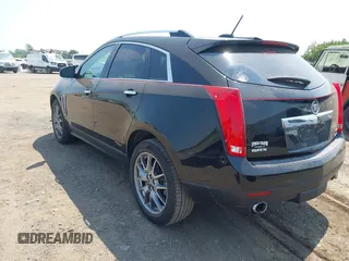 2015 Cadillac SRX Premium Collection with VIN 3GYFNDE38FS569129, listed as a IAAI auction lot 42485655 with 96,717 mi miles and . Bid and sale history available at DreamBid. Image 3.