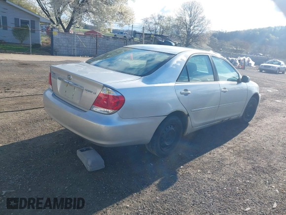 2004 Toyota Camry LE with VIN 4T1BE32K64U282875, listed as a IAAI auction lot 42038006 with 238,605 mi miles. Bid and sale history available at carsss.com. Image 4.