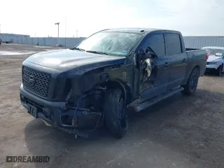 2018 Nissan Titan SV with VIN 1N6AA1E64JN529022, listed as a IAAI auction lot 41127756 with 150,166 mi miles. Bid and sale history available at carsss.com. Image 6.