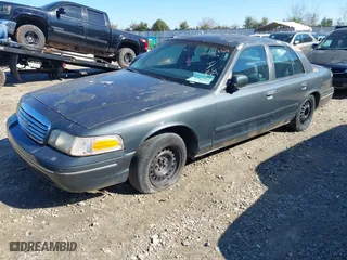 1998 Ford Crown Victoria Police Pkg with VIN 2FAFP71WXWX184526, listed as a IAAI auction lot 41563307 with 309,303 mi miles. Bid and sale history available at carsss.com. Image 2.