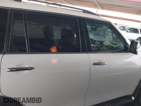 2018 Nissan Armada Platinum with VIN JN8AY2NC9J9552481, listed as a IAAI auction lot 42161022 with 95,415 mi miles and . Bid and sale history available at DreamBid. Image 14.