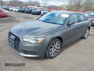 2013 Audi A6 Premium Plus z VIN WAUGGAFC1DN038375, wystawiony jako IAAI lot #42051929 z przebiegiem 118 181 mil mil oraz . Historia ofert i sprzedaży dostępna na DreamBid. Obrazek 18.
