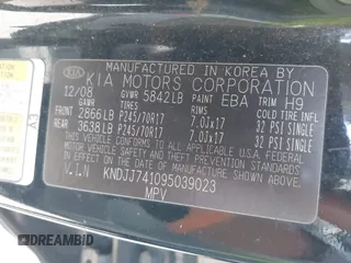 2009 Kia Borrego LX with VIN KNDJJ741095039023, listed as a IAAI auction lot 41696562 with 239,921 mi miles. Bid and sale history available at carsss.com. Image 9.