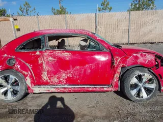 2014 Volkswagen Beetle Turbo R-Line with VIN 3VWVT7AT0EM603434, listed as a IAAI auction lot 41944413 with 64,470 mi miles and . Bid and sale history available at DreamBid. Image 13.