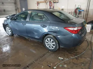 2016 Toyota Corolla L with VIN 5YFBURHE1GP441833, listed as a IAAI auction lot 41857006 with 179,899 mi miles. Bid and sale history available at carsss.com. Image 3.