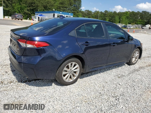 2023 Toyota Corolla LE with VIN 5YFB4MDE0PP051699, listed as a Copart auction lot 53589734 with 21,080 mi miles and Salvage Title. Bid and sale history available at carsss.com. Image 3.