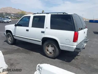 1997 Chevrolet Tahoe with VIN 1GNEK13R6VJ443195, listed as a IAAI auction lot 42000733 with 202,106 mi miles. Bid and sale history available at carsss.com. Image 3.
