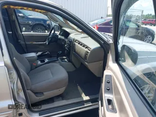 2004 Jeep Grand Cherokee Laredo with VIN 1J4GX48S34C258227, listed as a IAAI auction lot 42616107 with 160,424 mi miles and . Bid and sale history available at DreamBid. Image 5.
