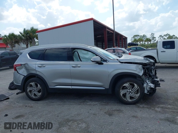 2022 Hyundai Santa Fe SEL with VIN 5NMS34AJXNH393589, listed as a IAAI auction lot 41908857 with 22,661 mi miles and . Bid and sale history available at DreamBid. Image 12.