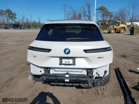 2023 BMW iX xDrive50 with VIN WB523CF0XPCM07644, listed as a IAAI auction lot 41867027 with 18,759 mi miles. Bid and sale history available at carsss.com. Image 17.