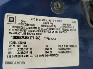 1999 GMC Suburban z VIN 1GKGK26J6XJ771768, wystawiony jako Copart lot #66300974 z przebiegiem 181 048 mil mil oraz Szkody całkowita. Historia ofert i sprzedaży dostępna na DreamBid. Obrazek 13.