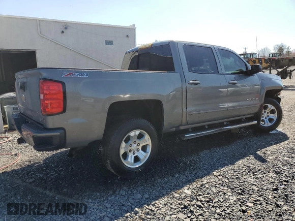2017 Chevrolet Silverado 1500 LT with VIN 3GCUKREC0HG335785, listed as a Copart auction lot 51456305 with 104,614 mi miles and Salvage Title. Bid and sale history available at DreamBid. Image 3.