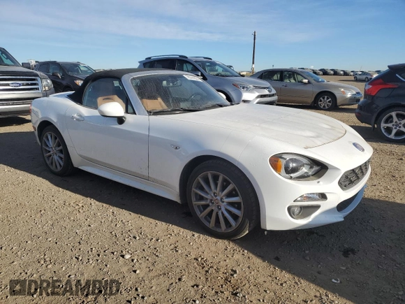 2017 FIAT 124 Spider Classica with VIN JC1NFAEK2H0105829, listed as a Copart auction lot 76741874 with 52,992 mi miles and Clean title. Bid and sale history available at DreamBid. Image 4.