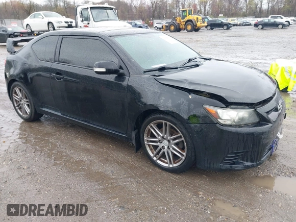 2013 Scion tC with VIN JTKJF5C79D3051664, listed as a IAAI auction lot 42027579 with 211,322 mi miles. Bid and sale history available at carsss.com. Image 1.