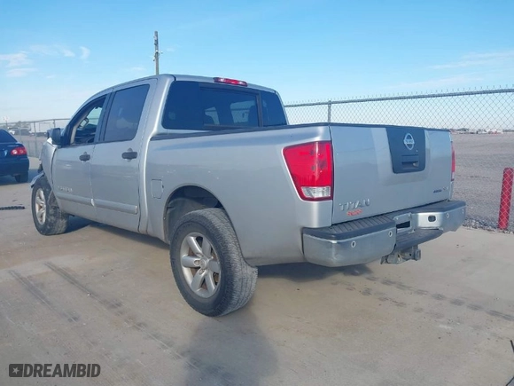 2012 Nissan Titan SV with VIN 1N6BA0ED0CN327021, listed as a IAAI auction lot 40980614 with 181,154 mi miles. Bid and sale history available at carsss.com. Image 3.
