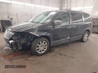 2011 Chrysler Town & Country Touring-L with VIN 2A4RR8DG5BR799358, listed as a IAAI auction lot 41650275 with 143,779 mi miles. Bid and sale history available at carsss.com. Image 2.