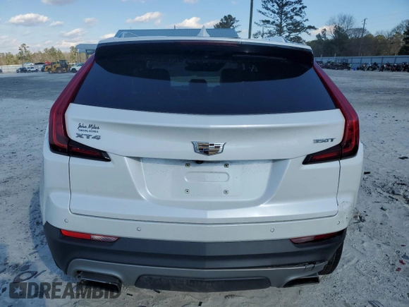 2022 Cadillac XT4 FWD Premium Luxury with VIN 1GYFZCR45NF100049, listed as a Copart auction lot 87232634 with 62,391 mi miles and Salvage title. Bid and sale history available at DreamBid. Image 6.