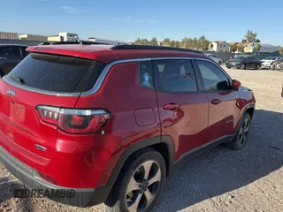 2018 Jeep Compass Latitude with VIN 3C4NJCBB1JT241010, listed as a Copart auction lot 54275095 with 99,073 mi miles and Salvage Title. Bid and sale history available at carsss.com. Image 4.