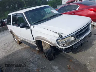 2000 Ford Explorer Eddie Bauer z VIN 1FMDU74E0YUB41056, wystawiony jako IAAI lot #42258224 z przebiegiem 134 401 mil mil oraz . Historia ofert i sprzedaży dostępna na DreamBid. Obrazek 1.