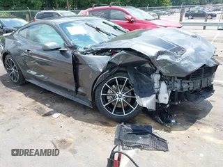 2020 Ford Mustang EcoBoost with VIN 1FA6P8TH8L5166978, listed as a IAAI auction lot 42645078 with 56,171 mi miles and . Bid and sale history available at DreamBid. Image 1.