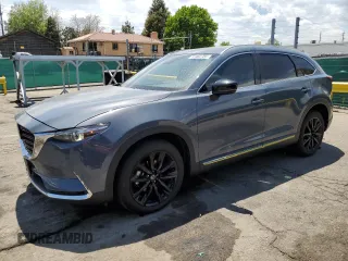 2023 Mazda CX-9 Grand Touring z VIN JM3TCBDYXP0655008, wystawiony jako Copart lot #57462785 z przebiegiem 15 502 mil mil oraz Czysty tytuł • Clean title. Historia ofert i sprzedaży dostępna na DreamBid. Obrazek 1.