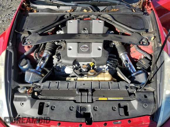 2014 Nissan 370Z Nismo with VIN JN1AZ4EH7EM630228, listed as a Copart auction lot 87024444 with 88,456 mi miles and Salvage title. Bid and sale history available at DreamBid. Image 12.