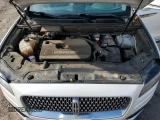 2019 Lincoln Nautilus Reserve z VIN 2LMPJ8L95KBL10165, wystawiony jako Copart lot #57593195 z przebiegiem 88 303 mil mil oraz Szkoda całkowita • Salvage title. Historia ofert i sprzedaży dostępna na DreamBid. Obrazek 12.