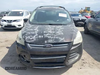 2013 Ford Escape SE with VIN 1FMCU0G96DUC34594, listed as a IAAI auction lot 42040437 with 161,847 mi miles and . Bid and sale history available at DreamBid. Image 12.