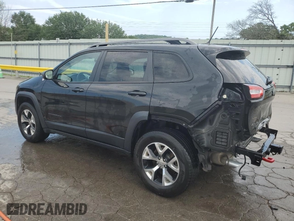 2014 Jeep Cherokee Trailhawk z VIN 1C4PJMBS2EW237725, wystawiony jako Copart lot #62666745 z przebiegiem 130 709 mil mil oraz Szkoda całkowita • Salvage title. Historia ofert i sprzedaży dostępna na DreamBid. Obrazek 2.