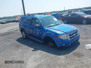 2011 Ford Escape XLT z VIN 1FMCU9D70BKA12908, wystawiony jako IAAI lot #42425419 z przebiegiem 286 179 mil mil oraz . Historia ofert i sprzedaży dostępna na DreamBid. Obrazek 1.