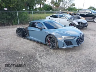 2021 Audi R8 z VIN WUAKBAFX5M7900468, wystawiony jako IAAI lot #41214857 z przebiegiem Nie podano mil oraz . Historia ofert i sprzedaży dostępna na DreamBid. Obrazek 1.
