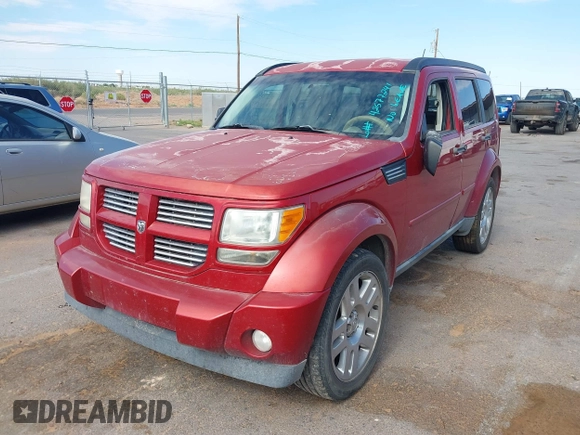 2010 Dodge Nitro Heat with VIN 1D4PT4GK6AW156839, listed as a IAAI auction lot 42577241 with 157,049 mi miles and . Bid and sale history available at DreamBid. Image 2.