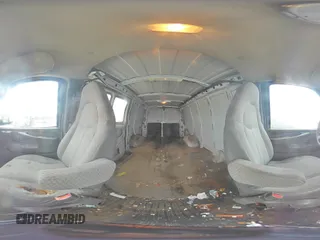 2003 Chevrolet Express Cargo z VIN 1GCHG35UX31215671, wystawiony jako Copart lot #47571675 z przebiegiem Nie podano mil oraz Szkoda całkowita • Salvage title. Historia ofert i sprzedaży dostępna na DreamBid. Obrazek 14.