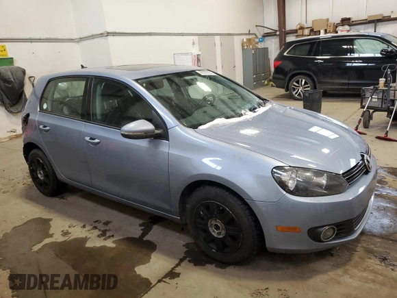 2012 Volkswagen Golf TDI with VIN WVWDM7AJ0CW144803, listed as a Copart auction lot 61574455 with 184,152 mi miles and Salvage title. Bid and sale history available at DreamBid. Image 4.