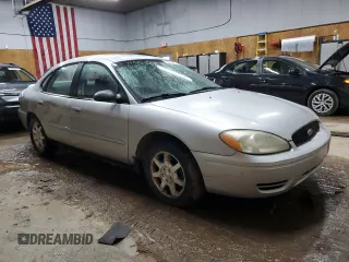 2004 Ford Taurus SE with VIN 1FAFP53224G175353, listed as a Copart auction lot 52713935 with 213,375 mi miles and Salvage Title. Bid and sale history available at DreamBid. Image 4.