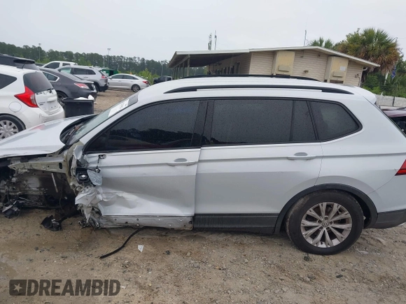 2018 Volkswagen Tiguan S with VIN 3VV1B7AX0JM041120, listed as a IAAI auction lot 42219662 with 160,852 mi miles and . Bid and sale history available at DreamBid. Image 14.