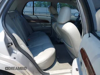2004 Mercury Grand Marquis GS z VIN 2MEFM74W54X673359, wystawiony jako IAAI lot #42441171 z przebiegiem 117 442 mil mil oraz . Historia ofert i sprzedaży dostępna na DreamBid. Obrazek 8.