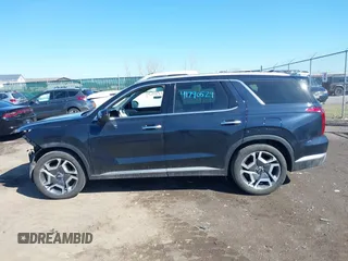 2024 Hyundai Palisade Limited z VIN KM8R5DGE1RU725867, wystawiony jako IAAI lot #41790529 z przebiegiem 33 869 mil mil oraz . Historia ofert i sprzedaży dostępna na DreamBid. Obrazek 14.