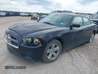 2013 Dodge Charger SE with VIN 2C3CDXBG2DH526480, listed as a IAAI auction lot 42025293 with 147,385 mi miles. Bid and sale history available at carsss.com. Image 2.