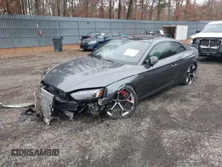 2023 Audi RS 5 z VIN WUANWAF55PA902356, wystawiony jako IAAI lot #41034121 z przebiegiem 3 717 mil mil oraz . Historia ofert i sprzedaży dostępna na DreamBid. Obrazek 2.
