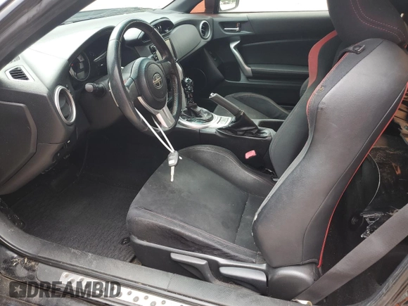 2016 Scion FR-S z VIN JF1ZNAA19G8702194, wystawiony jako Copart lot #56176685 z przebiegiem 116 445 mil mil oraz Szkoda całkowita • Salvage title. Historia ofert i sprzedaży dostępna na DreamBid. Obrazek 7.