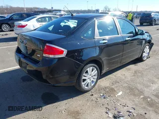 2009 Ford Focus SEL with VIN 1FAHP37N49W211350, listed as a IAAI auction lot 41641517 with 59,409 mi miles. Bid and sale history available at carsss.com. Image 4.