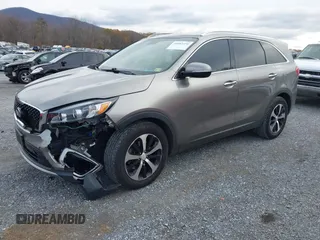 2016 Kia Sorento EX with VIN 5XYPH4A57GG107009, listed as a IAAI auction lot 40882550 with 163,329 mi miles. Bid and sale history available at carsss.com. Image 2.