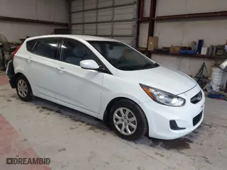 2013 Hyundai Accent GL with VIN KMHCT5AE6DU122559, listed as a IAAI auction lot 41800714 with 129,582 mi miles. Bid and sale history available at carsss.com. Image 1.